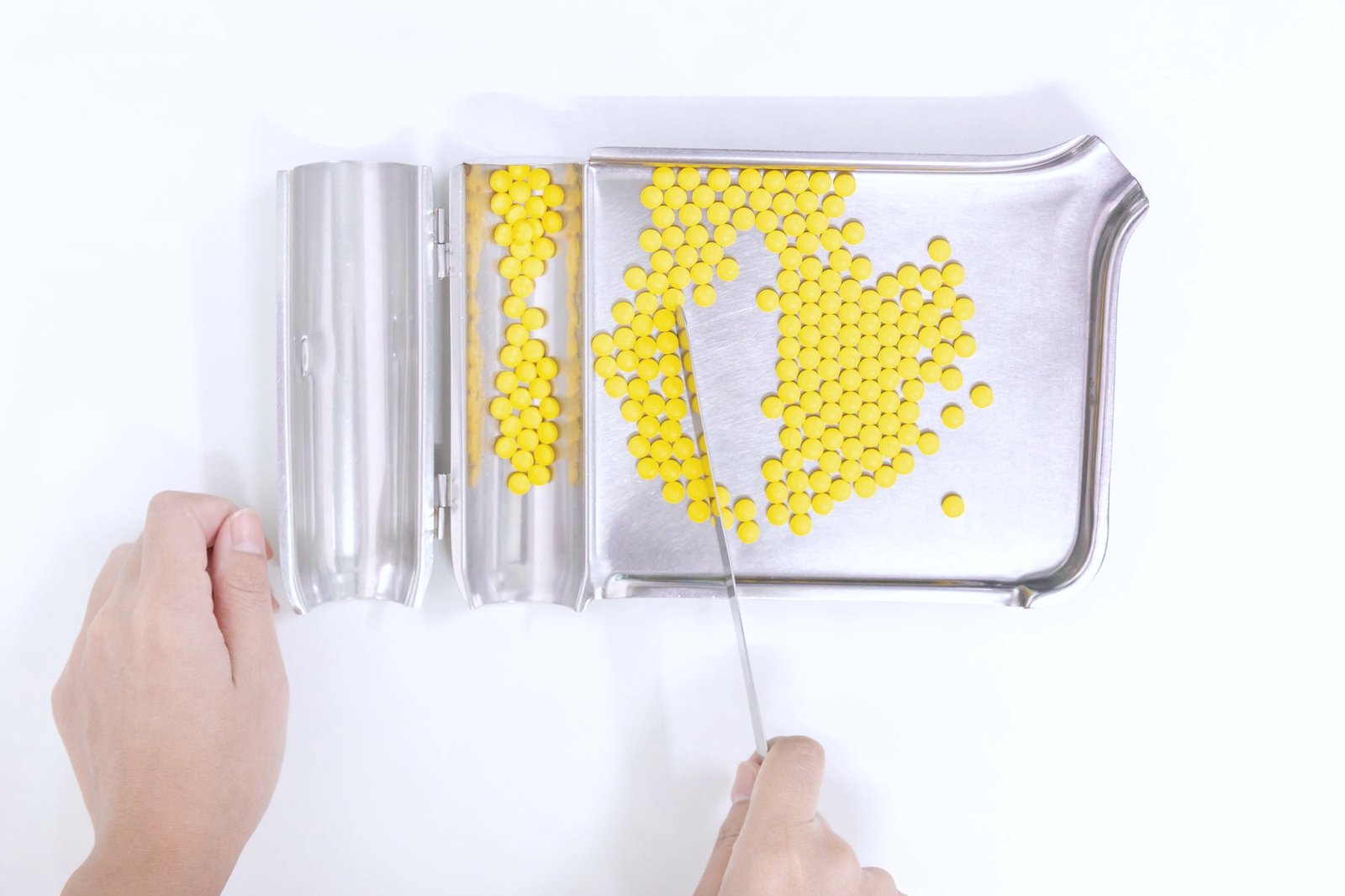 Tablets being counted on a pharmacy counting tray
