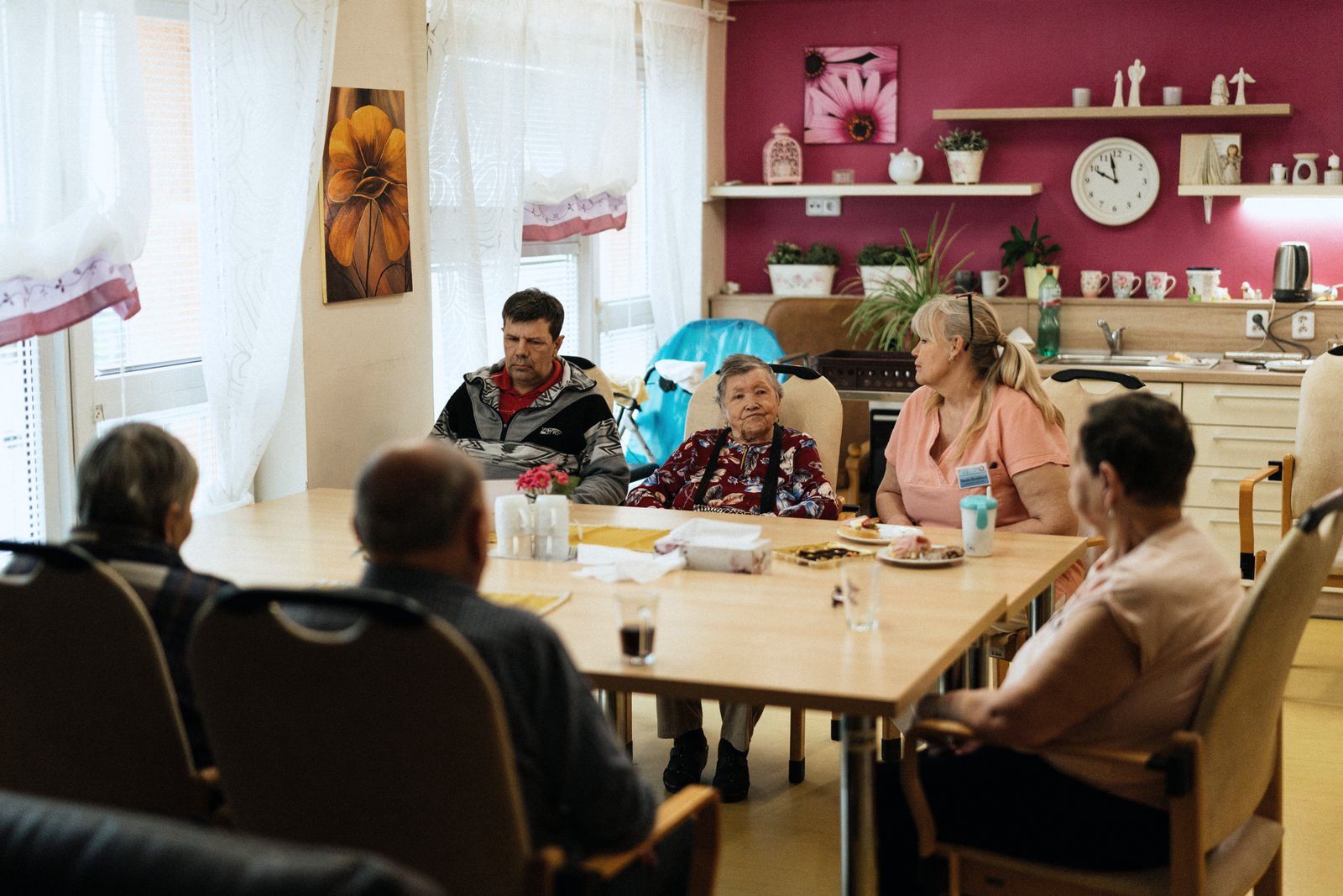 A patient support group meeting around a table