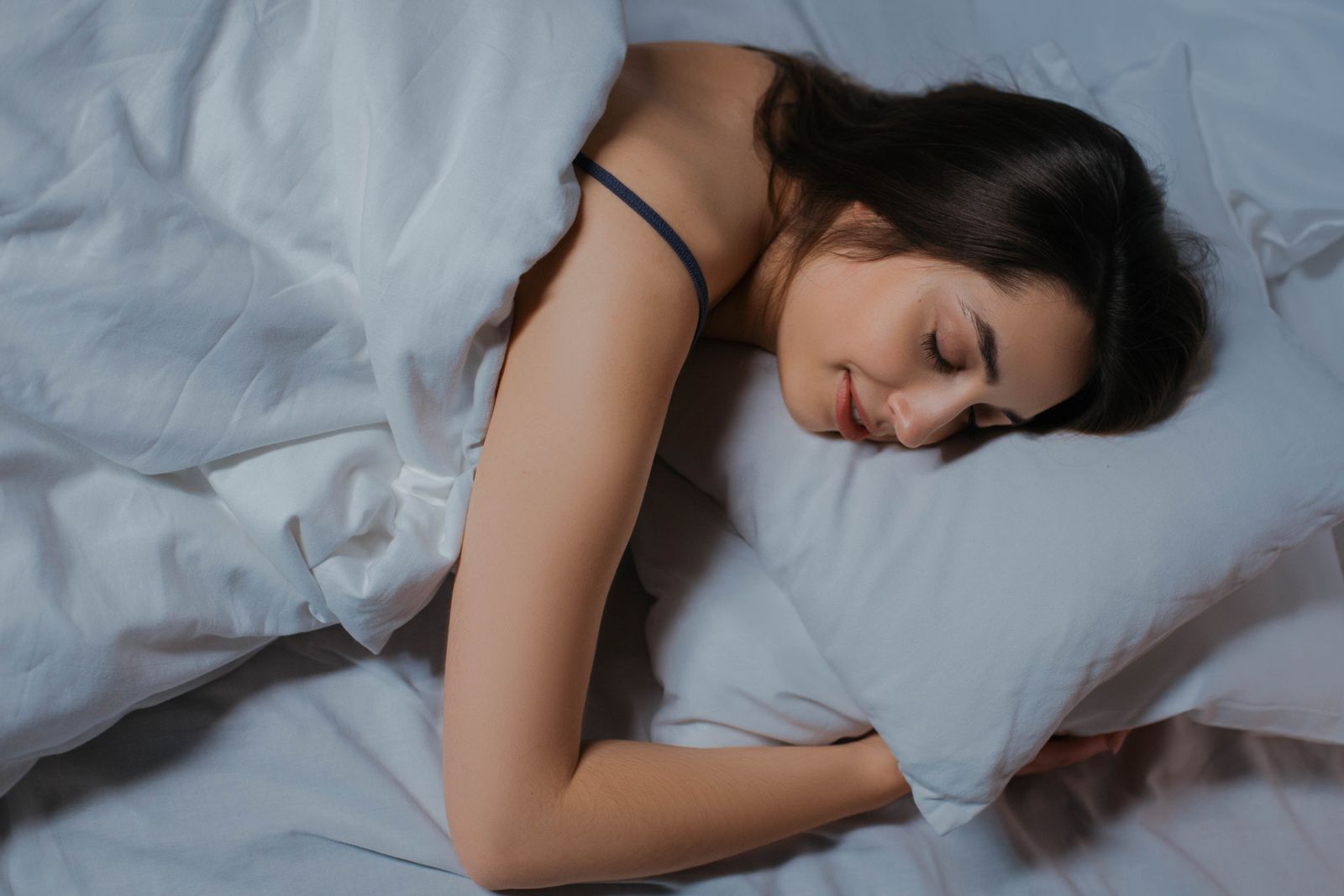 A woman asleep in bed